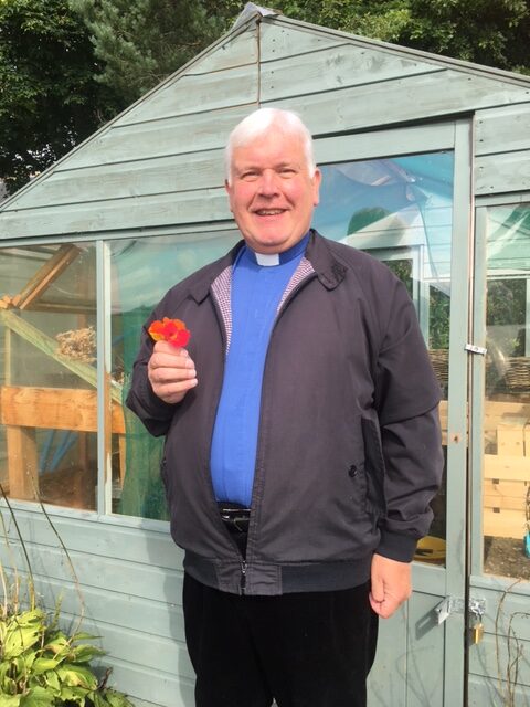 The Rev. Dr Jim Jack with Nasturtiums